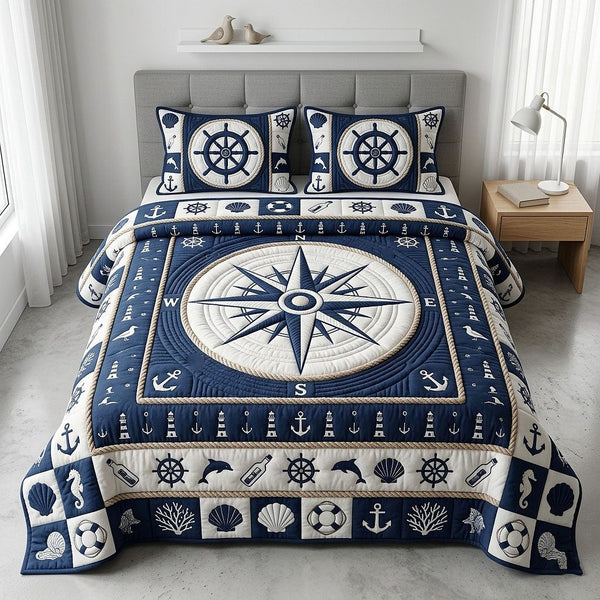 Ocean Voyage quilted 3-piece bedding set on a made bed in a light coastal bedroom