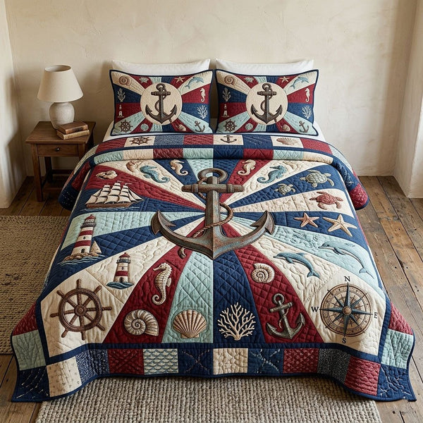 Ocean Voyage quilted 3-piece bedding set on a made bed in a light coastal bedroom