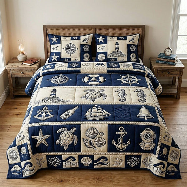 Ocean Voyage quilted 3-piece bedding set on a made bed in a light coastal bedroom