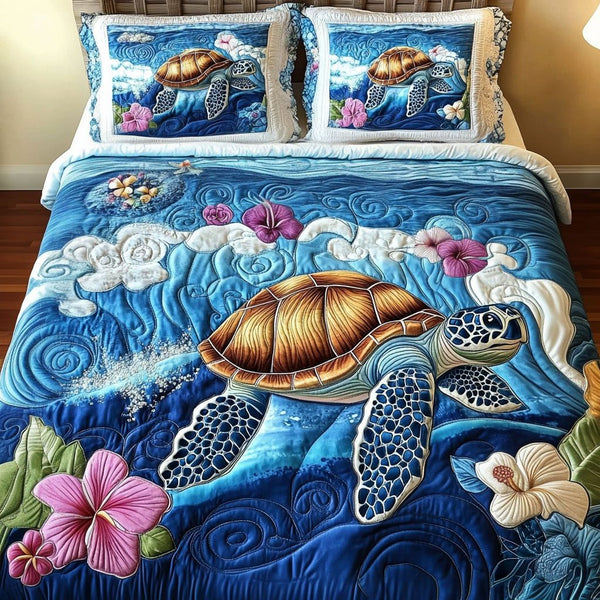 Ocean Voyage quilted 3-piece bedding set on a made bed in a light coastal bedroom