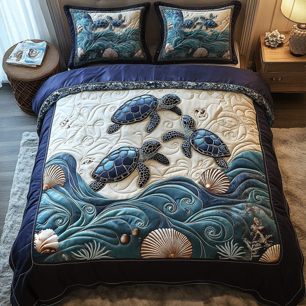 Ocean Voyager quilted 3-piece bedding set on a made bed in a light coastal bedroom
