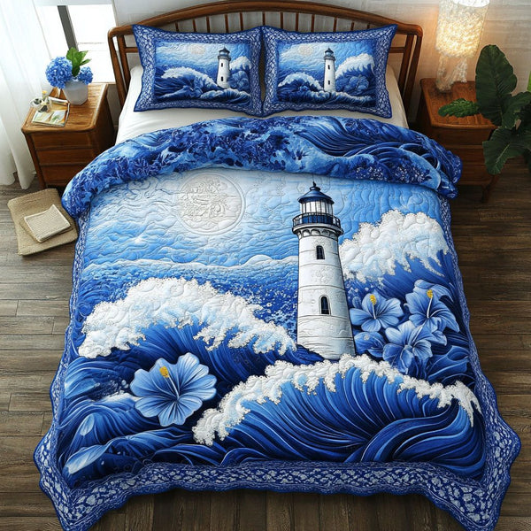 Ocean Watch quilted 3-piece bedding set on a made bed in a light coastal bedroom