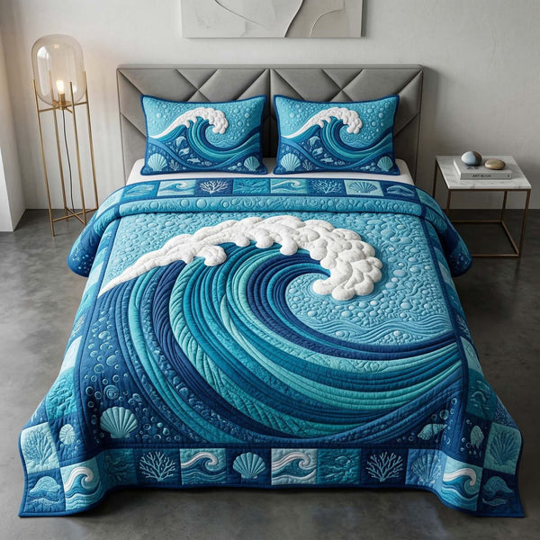 Ocean Wave quilted 3-piece bedding set on a made bed in a light coastal bedroom