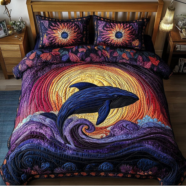 Ocean Whale quilted 3-piece bedding set on a made bed in a light coastal bedroom