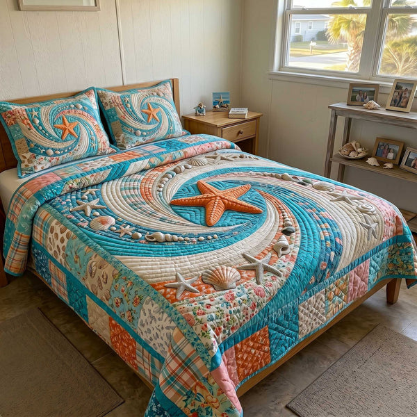 Ocean Whirl quilted 3-piece bedding set on a made bed in a light coastal bedroom
