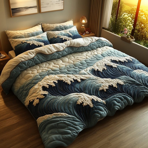Ocean Whirl quilted 3-piece bedding set on a made bed in a light coastal bedroom