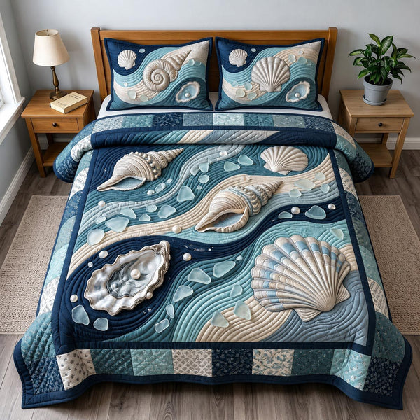 Ocean Whisper quilted 3-piece bedding set on a made bed in a light coastal bedroom