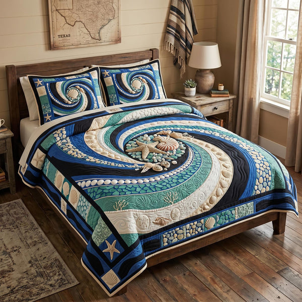 Ocean Whisper quilted 3-piece bedding set on a made bed in a light coastal bedroom