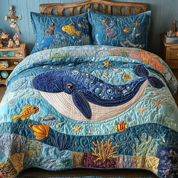 Ocean Whispers quilted 3-piece bedding set on a made bed in a light coastal bedroom