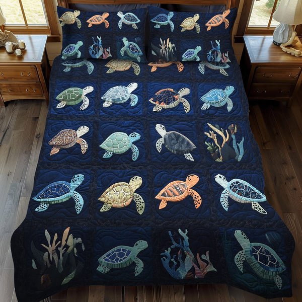 Oceanic Odyssey quilted 3-piece bedding set on a made bed in a light coastal bedroom