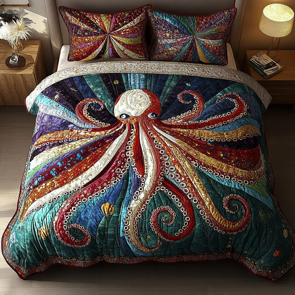 Octo Mirage quilted 3-piece bedding set on a made bed with two matching pillow shams