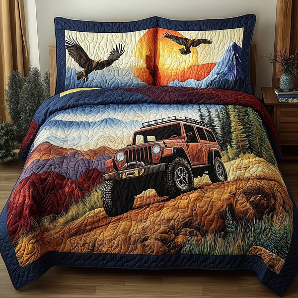 Off-Road Legend quilted 3-piece bedding set on a made bed with two matching pillow shams
