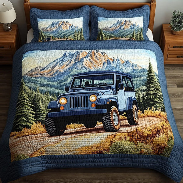Off-Road Life quilted 3-piece bedding set on a made bed with two matching pillow shams