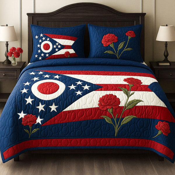 Ohio Flag of Flowers quilted 3-piece bedding set on a made bed in a warmly lit bedroom
