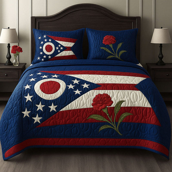 Ohio Floral Pride quilted 3-piece bedding set on a made bed with two matching pillow shams