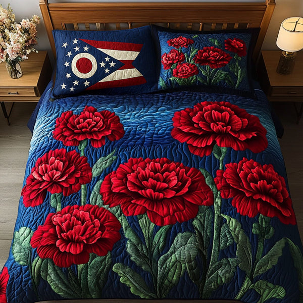 Ohio Scarlet State Flower quilted 3-piece bedding set on a made bed with two matching pillow shams