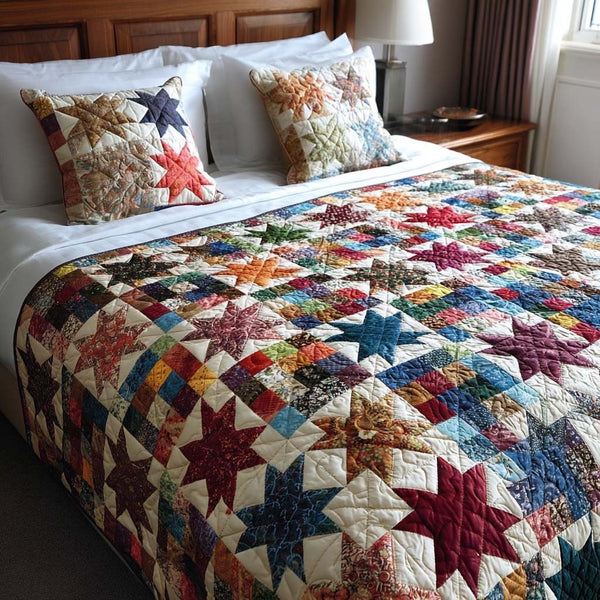 Old West Star quilted 3-piece bedding set on a made bed with two matching pillow shams