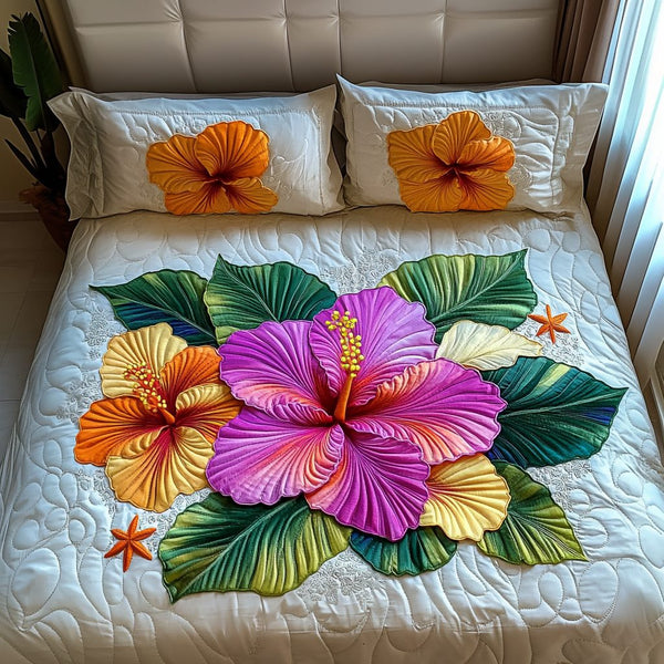 Opulent Petals quilted 3-piece bedding set on a made bed with two matching pillow shams