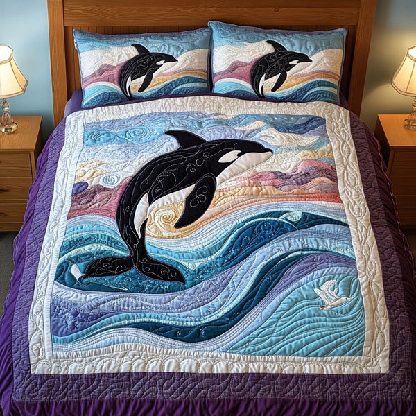 Orca Grace quilted 3-piece bedding set on a made bed with two matching pillow shams