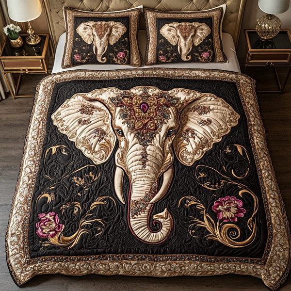 Ornate Elephant quilted 3-piece bedding set on a made bed with two matching pillow shams