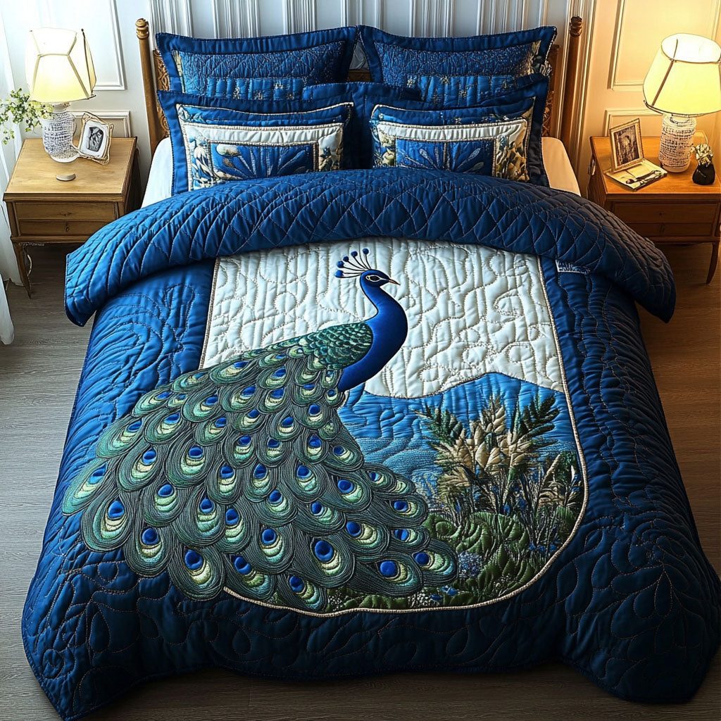 Ornate Feathered Beauty quilted 3-piece bedding set on a made bed with two matching pillow shams