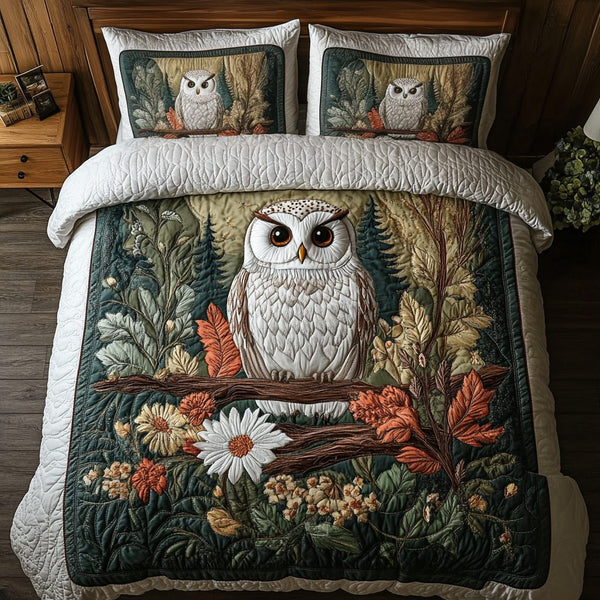 Owl Blossom quilted 3-piece bedding set on a made bed with two matching pillow shams
