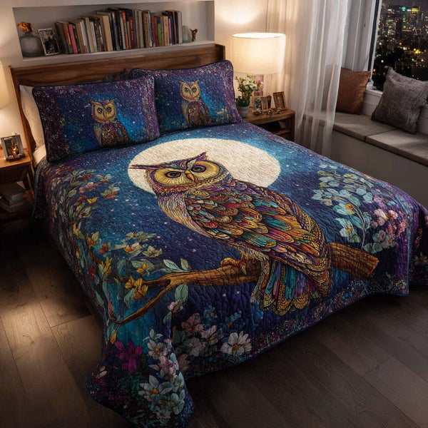 Owl Dream quilted 3-piece bedding set on a made bed with two matching pillow shams