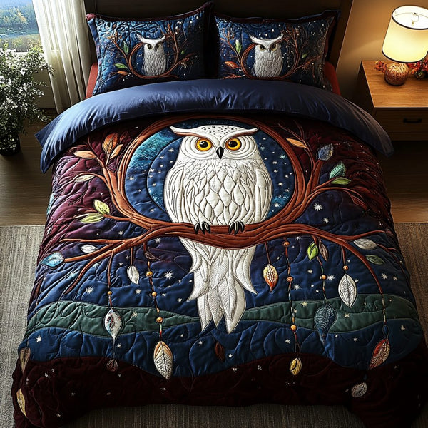 Owl Embrace quilted 3-piece bedding set on a made bed with two matching pillow shams