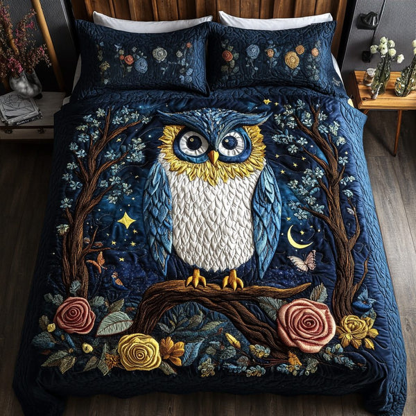 Owl Essence quilted 3-piece bedding set on a made bed with two matching pillow shams