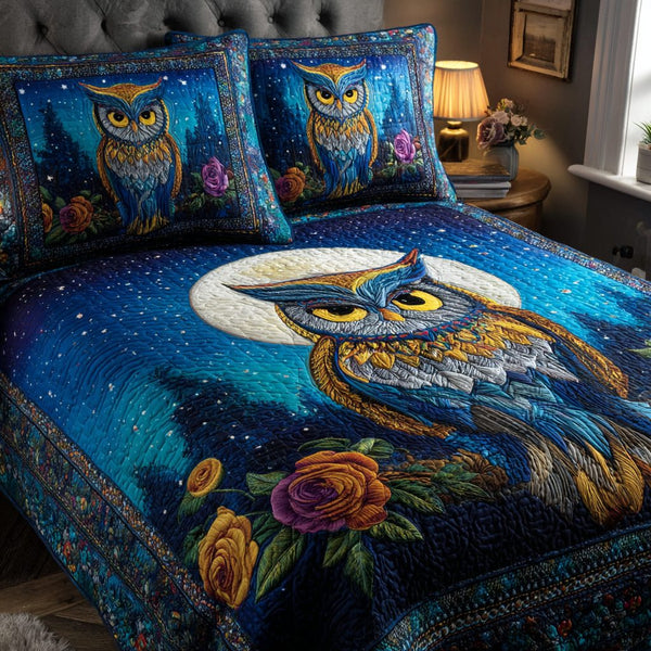 Owl Glow quilted 3-piece bedding set on a made bed with two matching pillow shams