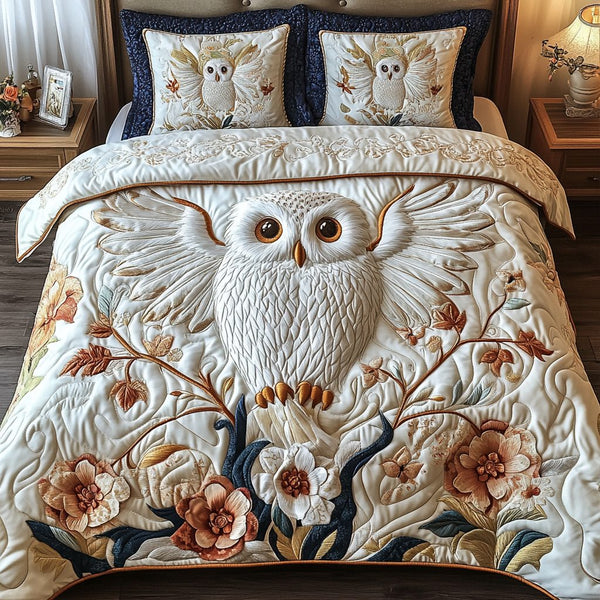 Owl Glow quilted 3-piece bedding set on a made bed with two matching pillow shams