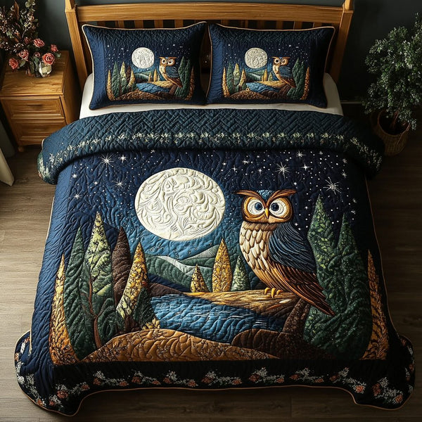 Owl Harmony quilted 3-piece bedding set on a made bed with two matching pillow shams