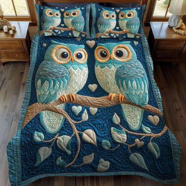 Owl Love You Forever quilted 3-piece bedding set on a made bed with two matching pillow shams