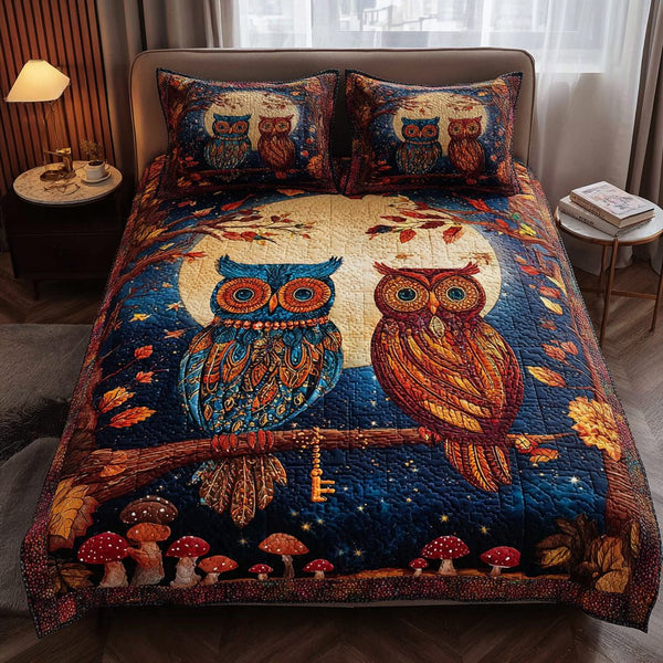 Owl Spirit quilted 3-piece bedding set on a made bed with two matching pillow shams