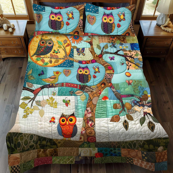 Owl Tree Patchwork quilted 3-piece bedding set on a made bed in a farmhouse bedroom