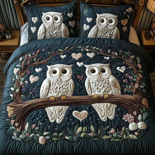 Owls quilted 3-piece bedding set on a made bed with two matching pillow shams