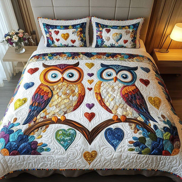 Owlways Yours quilted 3-piece bedding set on a made bed with two matching pillow shams