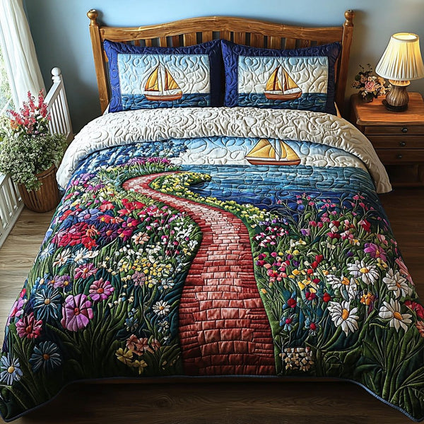 Painted Sails quilted 3-piece bedding set on a made bed with two matching pillow shams