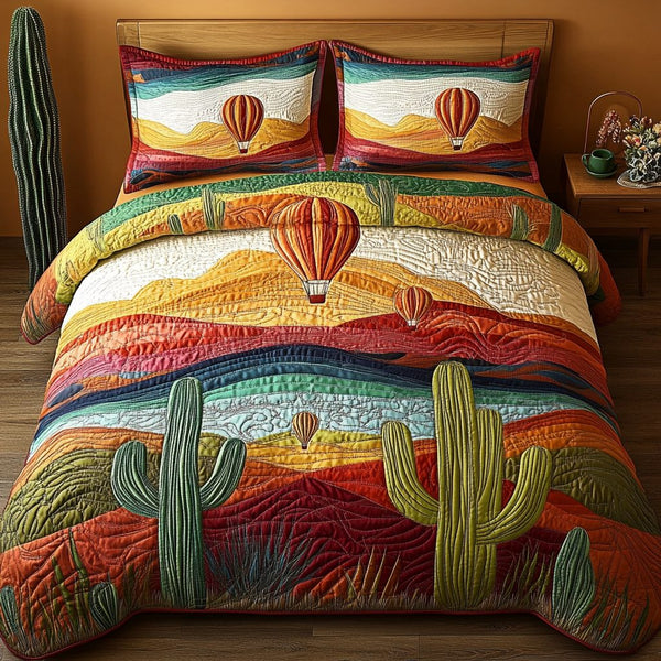 Painted Sky quilted 3-piece bedding set on a made bed with two matching pillow shams