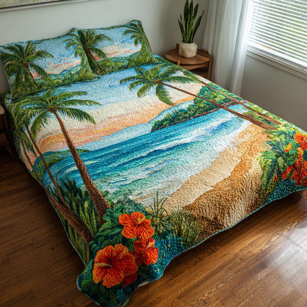 Palm Cove quilted 3-piece bedding set on a made bed in a light coastal bedroom