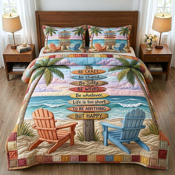Palm Paradise quilted 3-piece bedding set on a made bed in a light coastal bedroom