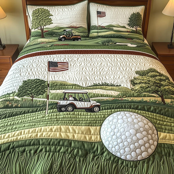 Par for the Night quilted 3-piece bedding set on a made bed with two matching pillow shams