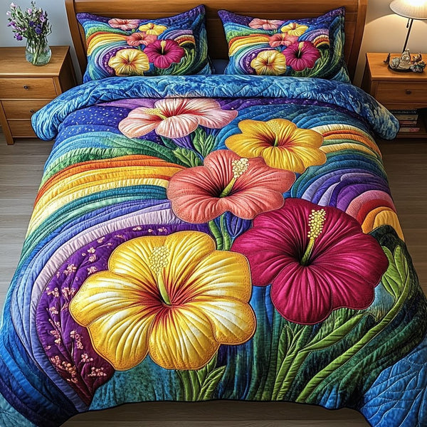 Paradise Flower quilted 3-piece bedding set on a made bed with two matching pillow shams