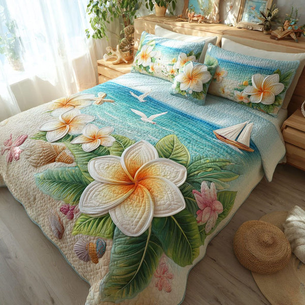 Paradise Shore quilted 3-piece bedding set on a made bed in a light coastal bedroom