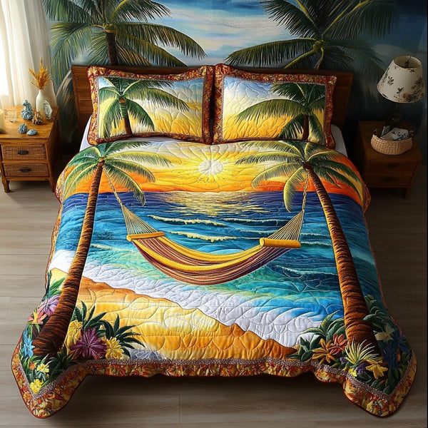 Paradise Sunrise quilted 3-piece bedding set on a made bed with two matching pillow shams