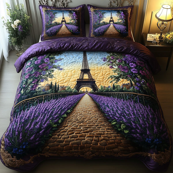 Paris Dreams quilted 3-piece bedding set on a made bed with two matching pillow shams