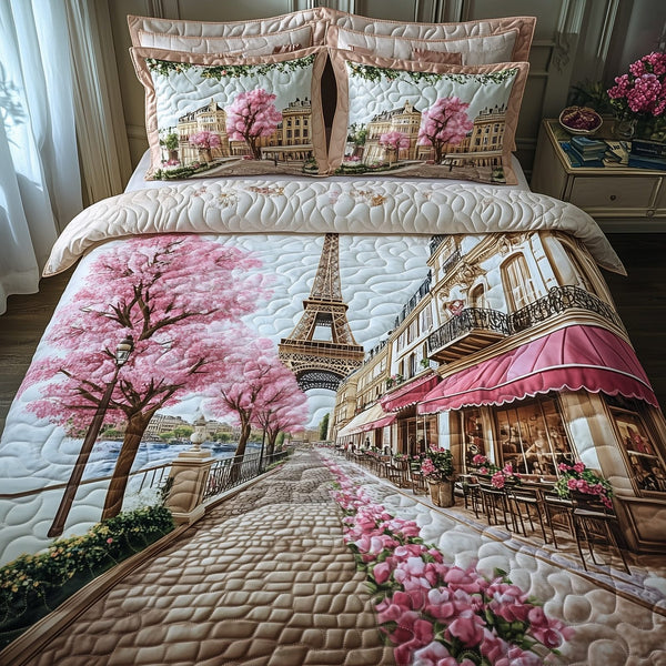 Paris in Bloom quilted 3-piece bedding set on a made bed with two matching pillow shams