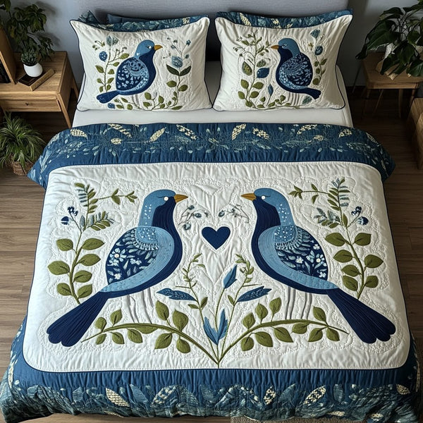 Passion Flight quilted 3-piece bedding set on a made bed with two matching pillow shams