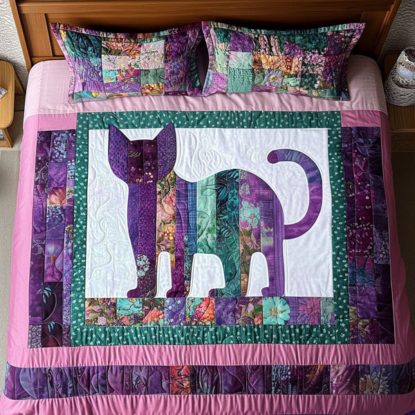 Pastel Cat Mosaic quilted 3-piece bedding set on a made bed with two matching pillow shams