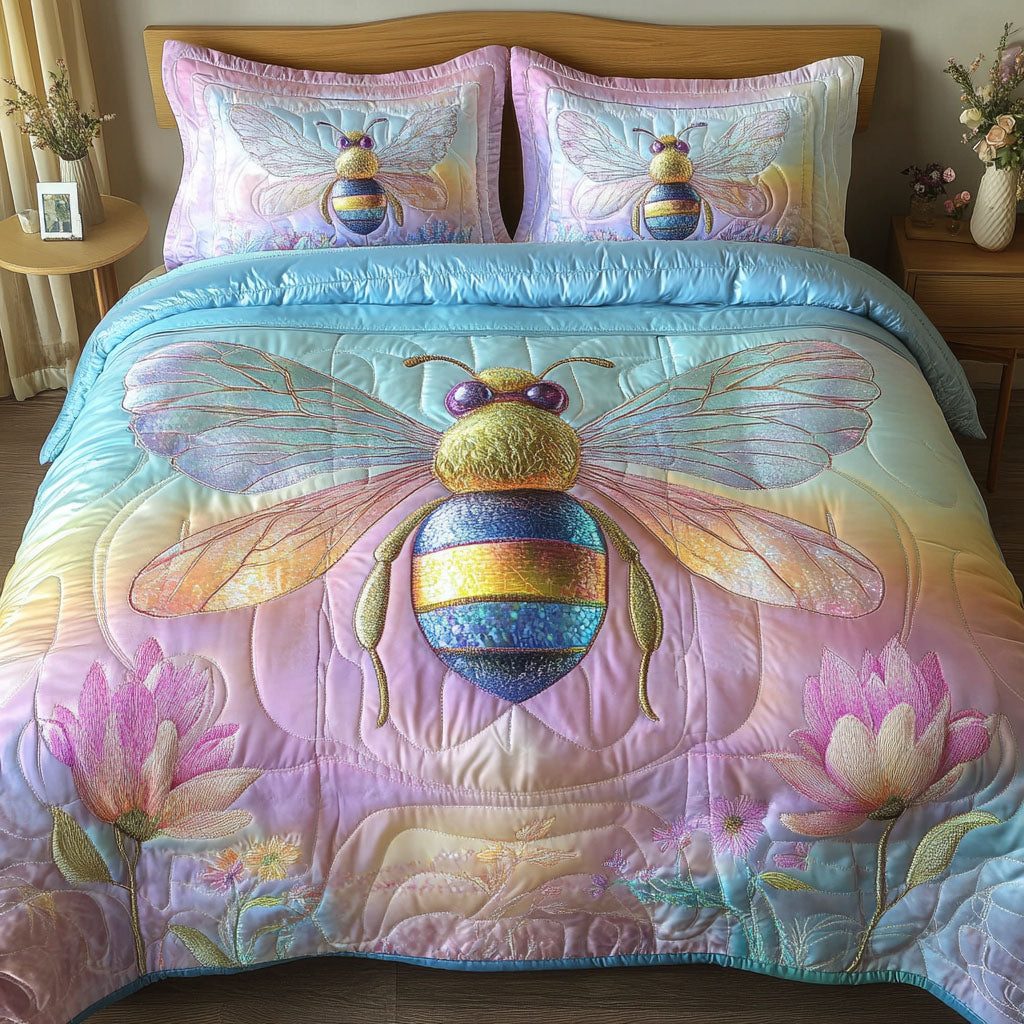 Pastel Dream Bee quilted 3-piece bedding set on a made bed with two matching pillow shams